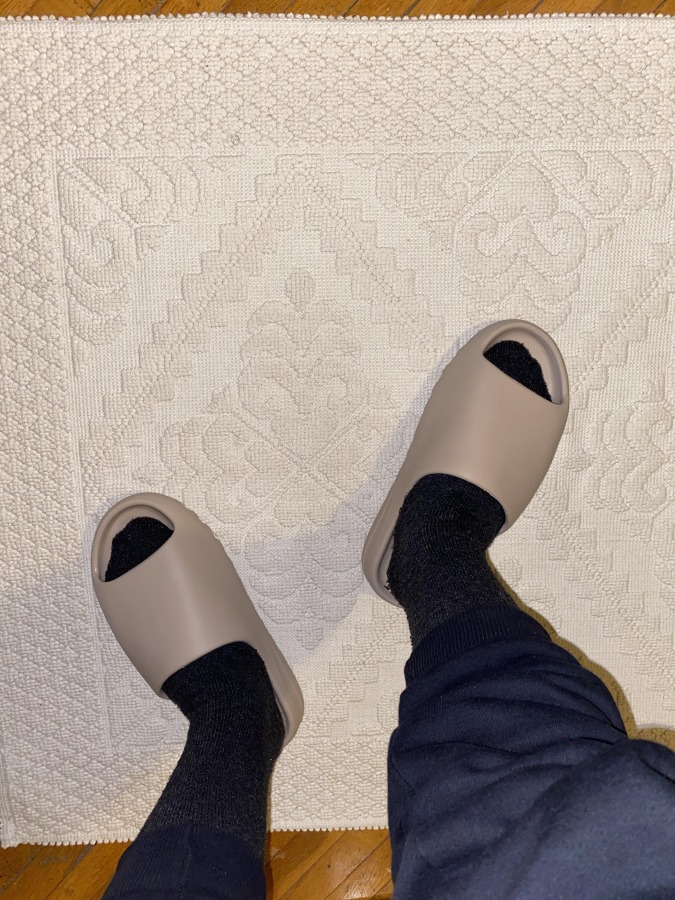 pure yeezy slides on feet