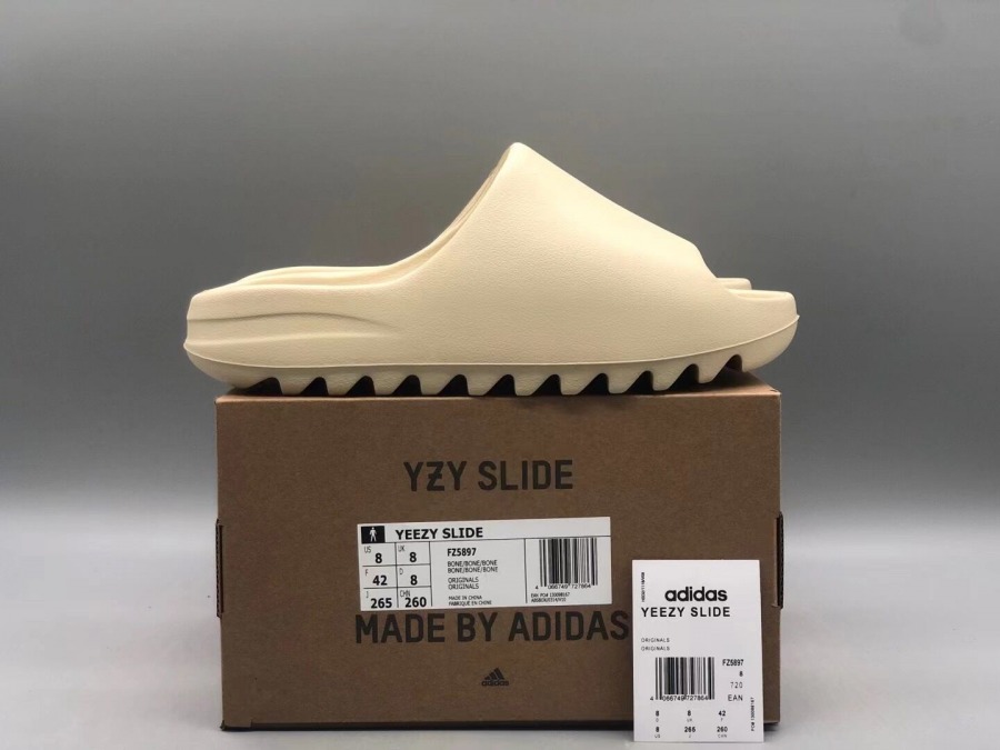 Yeezy Slides 'Bone' 2022 - SneakerCool.com